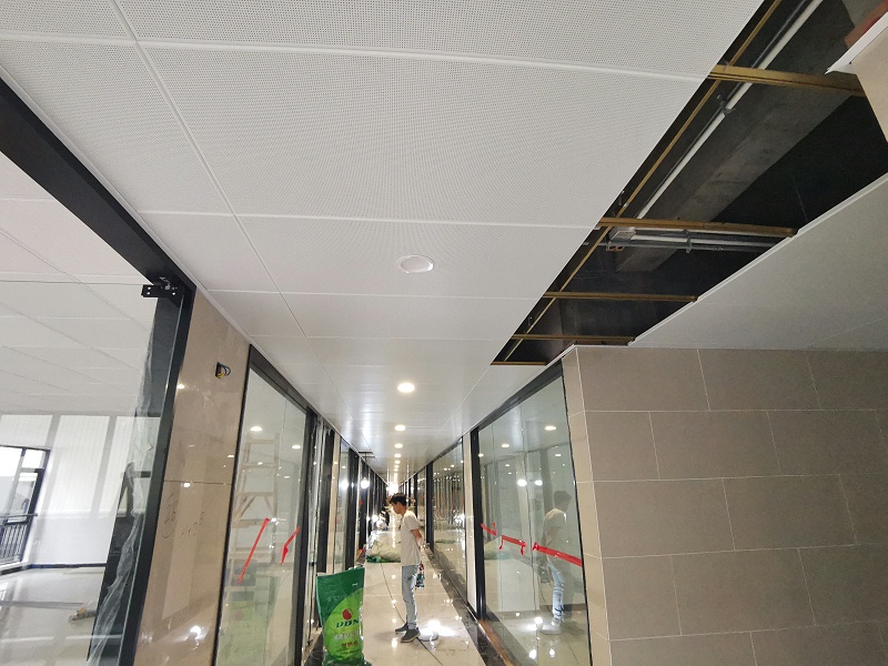 Punched aluminum gusset ceiling