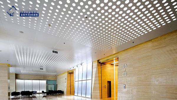 Punched aluminum veneer